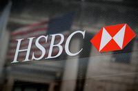FILE PHOTO: HSBC's logo is seen on a branch bank in the financial district in New York, U.S., August 7, 2019. REUTERS/Brendan McDermid/File Photo