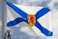 Nova Scotia's provincial flag flies on a flagpole in Ottawa, Friday July 3, 2020. A 12-year-old boy from Cape Breton is facing charges after he allegedly stole a truck on Monday morning. THE CANADIAN PRESS/Adrian Wyld