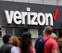 In this Tuesday, May 2, 2017, file photo, Verizon corporate signage is captured on a store in Manhattan's Midtown area, in New York.