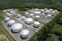 FILE PHOTO: Holding tanks are seen in an aerial photograph at Colonial Pipeline's Dorsey Junction Station in Woodbine, Maryland, U.S. May 10, 2021. REUTERS/Drone Base/File Photo