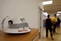 FILE PHOTO: A Rio Tinto logo is seen on a helmet in an office at Oyu Tolgoi copper mine in the Gobi Desert, Mongolia March 13, 2023. REUTERS/B. Rentsendorj/File Photo
