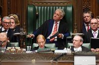 A handout picture released by the UK Parliament shows Britain's Speaker of the House of Commons John Bercow making some personal remarks to thank staff, members and family members in the House of Commons in London on October 30, 2019 ahead of his retirement on October 31. - The UK parliament on Thursday narrowly approved Prime Minister Boris Johnson's annual legislative programme, delivering his minority government a symbolic win as he pushed for a snap general election. Parliament's lower House of Commons approved the proposal, which does not directly deal with the Brexit crisis, by 310 to 294 votes. (Photo by JESSICA TAYLOR / various sources / AFP) / RESTRICTED TO EDITORIAL USE - MANDATORY CREDIT " AFP PHOTO / UK PARLIAMENT / Jessica Taylor " - NO USE FOR ENTERTAINMENT, SATIRICAL, MARKETING OR ADVERTISING CAMPAIGNS - EDITORS NOTE THE IMAGE HAS BEEN DIGITALLY ALTERED AT SOURCE TO OBSCURE VISIBLE DOCUMENTS /  (Photo by JESSICA TAYLOR/AFP via Getty Images)