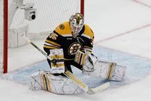 Boston Bruins goaltender Linus Ullmark makes a blocker save against the Florida Panthers during the third period of Game 1 of an NHL hockey playoff series Monday, April 17, 2023, in Boston. (AP Photo/Winslow Townson)