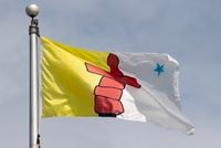 Nunavut's provincial flag flies on a flag pole in Ottawa,  Tuesday June 30, 2020. THE CANADIAN PRESS/Adrian Wyld