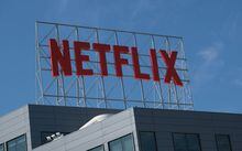 (FILES) In this file photo taken on March 2, 2022, The Netflix logo is seen on top of their office building in Hollywood, California. - Just as "Drive to Survive" helped Forumula 1 get back on tracks, the new "Break Point" Netflix sport documentary serie stimulates world-wide tennis, with a hype, backstage and immersive format, as it is released during the Australia Open tournament. (Photo by Chris DELMAS / AFP) (Photo by CHRIS DELMAS/AFP via Getty Images)