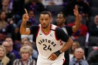 Toronto Raptors guard Norman Powell flashes celebrates after scoring a 3-point shot during the fourth quarter of an NBA basketball game against the Sacramento Kings in Sacramento, Calif., Sunday, March 8, 2020. The Raptors won 118-113. (AP Photo/Rich Pedroncelli)
