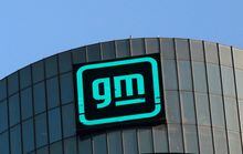 FILE PHOTO: The new GM logo is seen on the facade of the General Motors headquarters in Detroit, Michigan, U.S., March 16, 2021. REUTERS/Rebecca Cook/File Photo