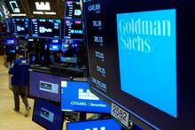 The logo for Goldman Sachs appears above a trading post on the floor of the New York Stock Exchange on July 13, 2021.