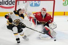 Florida Panthers goaltender Sergei Bobrovsky (72) deflects a shot from Boston Bruins left wing Tyler Bertuzzi (59) during the second period of Game 6 of an NHL hockey Stanley Cup first-round playoff series, Friday, April 28, 2023, in Sunrise, Fla. (AP Photo/Wilfredo Lee)