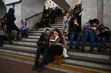 People take shelter inside a metro station during massive Russian missile attacks in Kyiv, Ukraine January 14, 2023. REUTERS/Viacheslav Ratynskyi