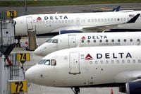 Delta Airlines passenger jets are pictured outside the newly completed 1.3 million-square foot $4 billion Delta Airlines Terminal C at LaGuardia Airport in the Queens borough of New York City, New York, U.S., June 1, 2022. REUTERS/Mike Segar