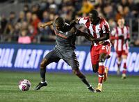 Forge FC's Ashtone Morgan (3) moves away from Atletico Ottawa's Abdoul Sissoko (20) during first half Canadian Premier League finals soccer action in Ottawa on Sunday, Oct. 30, 2022. Forge FC has signed veteran Canadian defender Ashtone Morgan to a new contract. THE CANADIAN PRESS/Justin Tang