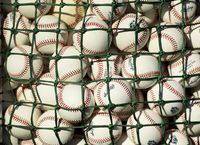 Baseballs are shown as the Toronto Blue Jays get ready for practice during baseball spring training in Dunedin, Fla., on Thursday, February 14, 2019. A former treasurer of a little league baseball organization in Coquitlam, B.C. is facing charges after $150,000 went missing from the league’s bank account. THE CANADIAN PRESS/Nathan Denette