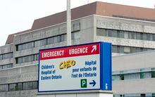 A sign directing visitors to the emergency department is shown at CHEO, Friday, May 15, 2015 in Ottawa. The large&nbsp;pediatric&nbsp;hospital says it’s contending with “unprecedented demand” as it reports a surge in cases of a common respiratory virus.THE CANADIAN PRESS/Adrian Wyld