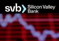SVB (Silicon Valley Bank) logo and decreasing stock graph are seen in this illustration taken March 19.