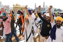 Activists of Sikh organisations shout pro-Khalistan and anti-government slogans after offering prayers on the occasion of the 37th anniversary of Operation Blue Star, at the Golden Temple in Amritsar on June 6, 2021. (Photo by NARINDER NANU / AFP) (Photo by NARINDER NANU/AFP via Getty Images)