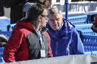 IOC (International Olympic Committee) President Thomas Bach, right, stands in the finish area of the alpine ski, men's World Championship downhill, in Courchevel, France, Sunday, Feb. 12, 2023. (AP Photo/Marco Trovati)