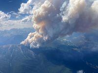 This July 24, 2023, handout image released by the British Columbia Wildfire Service, shows an aerial view of the Horsethief Creek wildfire, approximately 10kms (6.2 miles) west of Invermere, British Columbia, Canada. The wildfires, the largest ever recorded in Canada, have raged for two months, darkening Canadian and US skies with smoke and haze. The Canadian Interagency Forest Fire Centre reports about 1,090 active fires blaze throughout Canada, more than 670 of which are considered "out of control." (Photo by Handout / BC Wildfire Service / AFP) / RESTRICTED TO EDITORIAL USE - MANDATORY CREDIT "AFP PHOTO / BC Wildfire Service / Handout" - NO MARKETING NO ADVERTISING CAMPAIGNS - DISTRIBUTED AS A SERVICE TO CLIENTS (Photo by HANDOUT/BC Wildfire Service/AFP via Getty Images)
