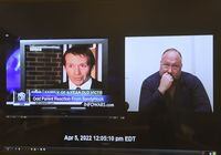 A video of Alex Jones responding to questions about Infowars segments covering the Sandy Hook massacre is presented to the jury panel during Jones' defamation trial at Superior Court in Waterbury, Conn., on Thursday, Sept. 29, 2022. (Brian A. Pounds/Hearst Connecticut Media via AP, Pool)