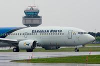 A Canadian North plane taxis to a runway prior to takeoff on June 26, 2019 in Ottawa. Canadian North says fuel shortages at several airports in the High Arctic are affecting the amount of passengers and cargo it can carry on some flights. THE CANADIAN PRESS/Adrian Wyld