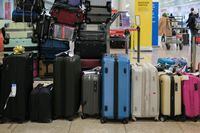 Suitcases are seen at Josep Tarradellas Barcelona-El Prat Airport, in Barcelona, Spain, November 19, 2021. REUTERS/Nacho Doce