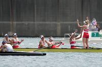 Gold medalists Lisa Roman, Kasia Gruchalla-Wesierski, Christine Roper, Andrea Proske, Susanne Grainger, Madison Mailey, Sydney Payne, Avalon Wasteneys and Kristen Kit of Canada celebrate after competing in the women's rowing eight final lat the 2020 Summer Olympics, Friday, July 30, 2021, in Tokyo, Japan. (AP Photo/Lee Jin-man)