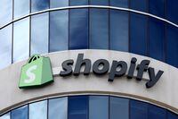 FILE PHOTO: The logo of Shopify is seen outside its headquarters in Ottawa, Ontario, Canada, September 28, 2018. REUTERS/Chris Wattie/  GLOBAL BUSINESS WEEK AHEAD/File Photo