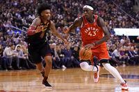 Toronto Raptors forward Pascal Siakam (43) drives to the net against Cleveland Cavaliers guard Kevin Porter Jr (4) during the first half at Scotiabank Arena.