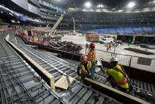 Workers build concrete forms during the Rogers Centre renovation in Toronto on Tuesday January 17, 2023. THE CANADIAN PRESS/Frank Gunn