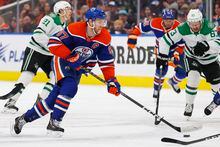 Mar 16, 2023; Edmonton, Alberta, CAN; Edmonton Oilers forward Connor McDavid (97) looks to make a pass in front of Calls Stars forward Evgenii Dadonov (63) during the first period at Rogers Place. Mandatory Credit: Perry Nelson-USA TODAY Sports