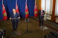Ontario Premier Doug Ford (left), and Minister of Municipal Affairs and Housing Steve Clark (right), speak to the media during a press conference following the release of the Auditor General’s Special Report on Changes to the Greenbelt, at Queens Park, in Toronto, Wednesday, Aug. 9, 2023. THE CANADIAN PRESS/Arlyn McAdorey