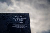 A photograph shows a sign of the World Economic Forum (WEF) in the alpine resort of Davos, on the opening day of the annual meeting in Davos on January 16, 2023. - The world's political and business elites gather for the annual Davos summit to promote "cooperation in a fragmented world", with war in Ukraine, the climate crisis and global trade tensions high on the agenda. (Photo by Fabrice COFFRINI / AFP) (Photo by FABRICE COFFRINI/AFP via Getty Images)