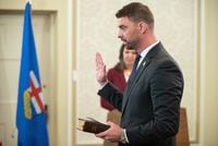 Dan Williams, Alberta's minister of mental health and addiction, has introduced updated legislation that it says would help make sure anyone who contributed to the opioid addiction crisis is held responsible. Williams is sworn into cabinet, in Edmonton on Friday, June 9, 2023. THE CANADIAN PRESS/Jason Franson.