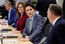 Canada's Prime Minister Justin Trudeau, with federal ministers and officials, take part in a meeting with Provincial and Territorial premiers to discuss healthcare in Ottawa, Ontario, Canada, February 7, 2023. REUTERS/Blair Gable