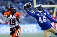 Winnipeg Blue Bombers' Desmond Lawrence (46) knocks down a pass intended for BC Lions' Dominique Rhymes (19) during the first half of CFL western final action in Winnipeg, Sunday, Nov. 13, 2022. THE CANADIAN PRESS/John Woods