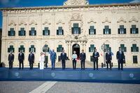 Participants into the Malta Mediterranean Summit pose for a family photo at Castille Square in Valletta, Malta, Friday, Sept. 29, 2023. The leaders of nine southern European Union countries met in Malta on Friday, Sept. 29, 2023, to discuss common challenges such as migration, the EU's management of which has vexed national governments in Europe for years. (AP Photo/Rene Rossignaud)