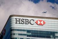(FILES) In this file photo taken on July 31, 2018 The HSBC UK headquarters are seen at the Canary Wharf financial district of London on July 31, 2018. - The British banking giant HSBC has decided to relaunch its restructuring plan involving 35,000 job cuts worldwide, after having suspended it for a while during the pandemic. (Photo by Tolga Akmen / various sources / AFP) (Photo by TOLGA AKMEN/Tolga Akmen/AFP via Getty Images)