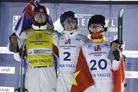 Left to right: second-place, Marion Thenault of Canada; first-place, Danielle Scott of Australia; third-place, Fanyu Kong of China celebrate on the podium after the women's aerials World Cup competition Friday, Feb. 3, 2023, in Park City, Utah. (AP Photo/Jeff Swinger)c