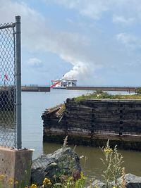 Smoke rises from the MV Holiday Island ferry after a fire broke out, at Prince Edward Island, Canada July 22, 2022,  in this picture obtained from social media. Shaun MacLaughlin/via REUTERS  THIS IMAGE HAS BEEN SUPPLIED BY A THIRD PARTY. MANDATORY CREDIT. NO RESALES. NO ARCHIVES.
