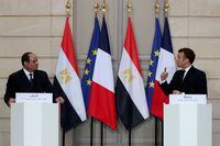 Egyptian President Abdel Fattah al-Sisi and French President Emmanuel Macron attend a joint news conference at the Elysee palace, in Paris on Dec. 7, 2020.