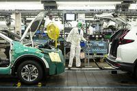An autoworker stands on the production line for the Honda CRV, at a Honda plant in Alliston, Ont., on Wednesday, March 16, 2022. Statistics Canada says manufacturing sales rose 2.5 per cent to $70.2 billion in March, helped by higher prices. THE CANADIAN PRESS/Chris Young
