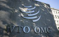 A logo is seen at the World Trade Organization (WTO) headquarters before a news conference in Geneva, Switzerland, October 5, 2022. REUTERS/Denis Balibouse