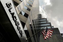 FILE PHOTO: A sign for BlackRock Inc hangs above their building in New York U.S., July 16, 2018. REUTERS/Lucas Jackson/File Photo