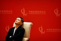 In this file photo taken Saturday, March 19, 2016, Jack Ma, executive chairman of the Alibaba Group, looks up during a panel discussion held as part of the China Development Forum at the Diaoyutai State Guesthouse in Beijing. Ma hasn't been seen since he angered regulators with an October 2020 speech. That is prompting speculation about what might happen to the billionaire founder of Alibaba Group, the world's biggest e-commerce company.(AP Photo/Mark Schiefelbein, File)