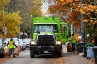 A truck from Canadian waste management company GFL Environmental Inc, which is planning an IPO, makes its rounds through a neighbourhood in Toronto, Ontario, Canada November 5, 2019. Picture taken November 5, 2019.  REUTERS/Carlos Osorio