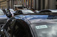 Taxis and ride share drivers pick up and drop off fares at Union station, in Toronto, on Wednesday, August 24, 2022.  (Christopher Katsarov/The Globe and Mail)