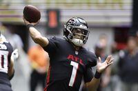 CORRECTS DATE TO SUNDAY, NOV. 6 INSTEAD OF TUESDAY, DEC. 6 - Atlanta Falcons quarterback Marcus Mariota throws a pass during the first half of an NFL football game against the Los Angeles Chargers, Sunday, Nov. 6, 2022, in Atlanta. (AP Photo/Butch Dill)