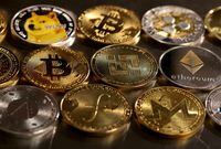 FILE PHOTO: Representations of cryptocurrencies are seen in this illustration, August 10, 2022. REUTERS/Dado Ruvic/Illustration/File Photo