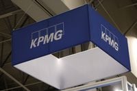 A banner for professional services network KPMG hangs above the Collision conference in Toronto, Ontario, Canada June 23, 2022. Picture taken June 23, 2022. REUTERS/Chris Helgren