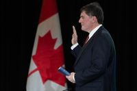 Minister of Public Safety, Democratic Institutions and Intergovernmental Affairs Dominic LeBlanc is sworn in before appearing as a witness at the Public Inquiry Into Foreign Interference in Federal Election Processes and Democratic Institutions, Friday, February 2, 2024 in Ottawa.  THE CANADIAN PRESS/Adrian Wyld